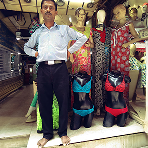Men standing in shop